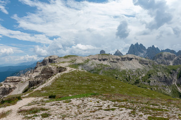 Fototapeta na wymiar Rugged Mountain Ranges in Tre Cima Natural Park Area in the Italian Dolomites.