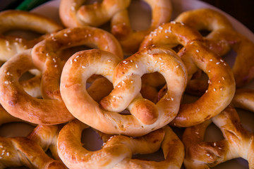 Homemade whole meal pretzels with sesame