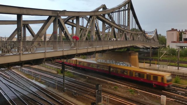 S-bahn in Berlin. The Berlin S-Bahn is a rapid transit railway system in and around Berlin, the capital city of Germany