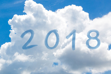 Naklejka na ściany i meble Year 2018 with cloud and blue sky background