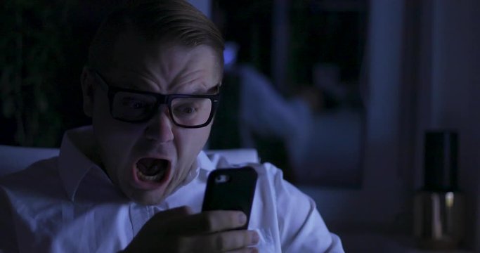 Angry man in the night office