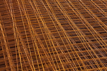 Background texture of steel rods used in construction to reinforce concrete