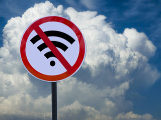 Road sign no wifi on sky background with clouds.