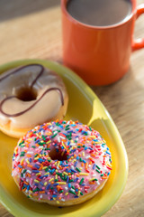 Donuts  with cup of hot chocolate