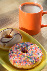 Donuts  with cup of hot chocolate
