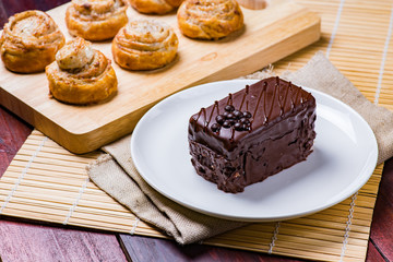 Chocolate cake on white plate