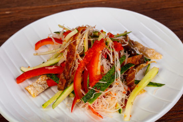 Asian salad with salmon skin