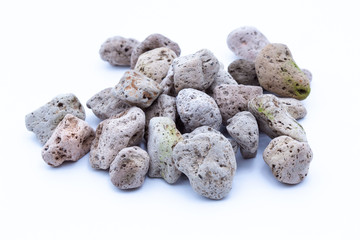 A natural piece of pumice stone isolated on white background.