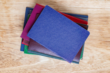 International passports on wooden background