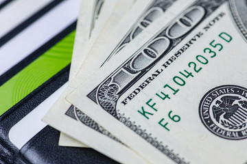 Wallet with dollar bills