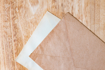 Envelopes on wooden background