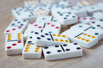 Dominos on wooden background