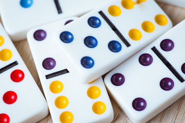Dominos on wooden background