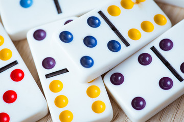 Dominos on wooden background