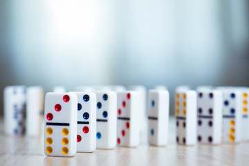 Dominos on wooden background