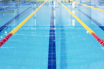 Row of starting blocks in a swimming pool