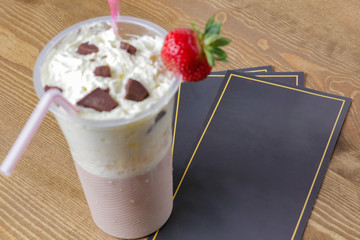 Fresh strawberry milkshake with chocolate