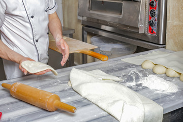 Man prepearing bread dough