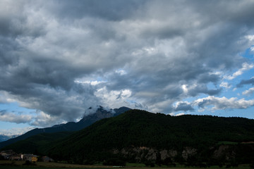 Obraz na płótnie Canvas Landscape with mountains and clouds