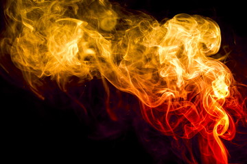 Colored smoke on black background