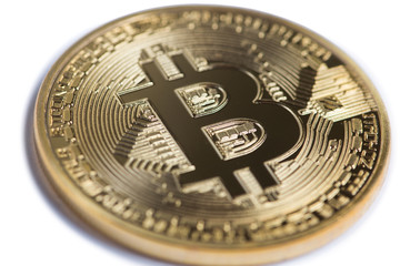 Fototapeta na wymiar Golden bitcoin isolated on white