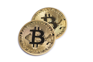 Golden bitcoin isolated on white