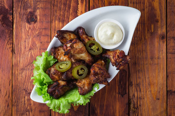 Fried chicken legs with jalopeno and mayonnaise
