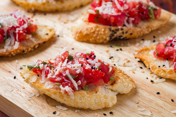 Canape on wooden background