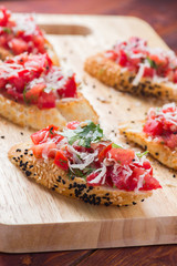 Canape on wooden background