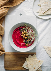 Roasted Beet Hummus in a ceramic bowl
