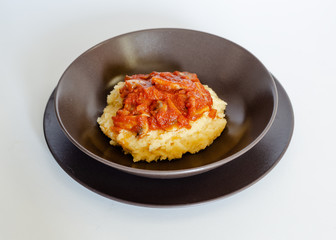Polenta with tomato mushroom sauce