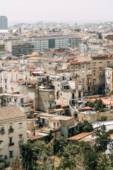 Fototapeta na wymiar Beautiful streets and courtyards of Naples, historical sites and sculptures of the city. The monuments and architecture of ancient Italy. panorama of the city, species and tourist places. 