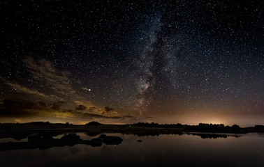 Night photography with Milky Way in Natural Area of Barruecos. Extremadura. Spain. - obrazy, fototapety, plakaty