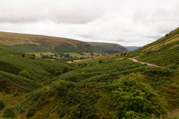 Naklejka premium road through the countryside of Wales