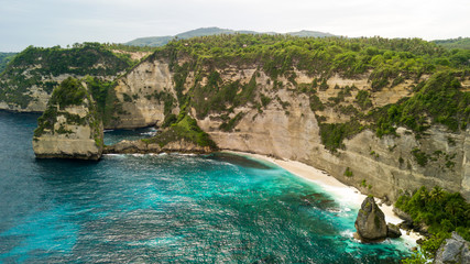Fototapeta na wymiar Aerial view of tropical rocky cliff coastline