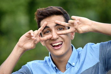 Latino Teen Boy And Peace Sign