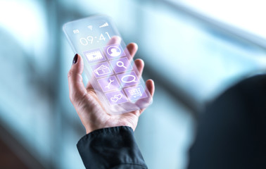 Transparent mobile phone. Futuristic glass smartphone. Cellphone with future digital technology...