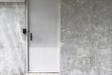 doors white color with steel handle and wall background