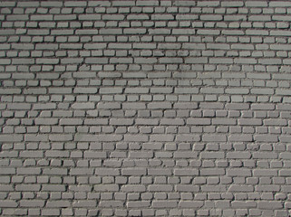 brick white wall textured and with a clear pattern of light
