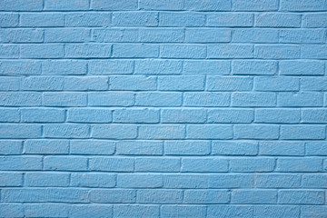 Painted external blue brick wall