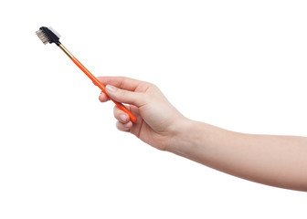 Brush for eyebrows in female hands isolated
