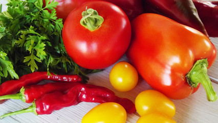 Fresh vegetables on wooden background.