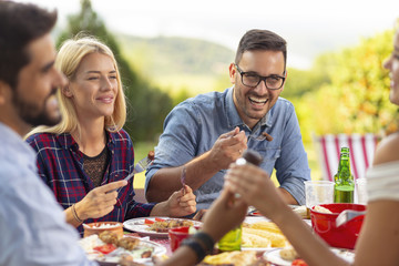 Friends having an outdoor lunch