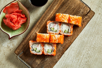Sushi served with wasabi, ginger and soy sauce