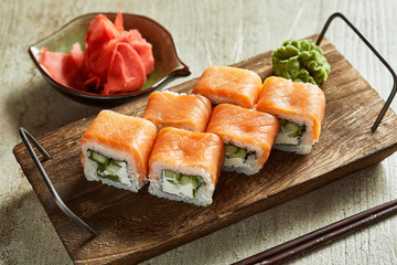Sushi served with wasabi, ginger and soy sauce