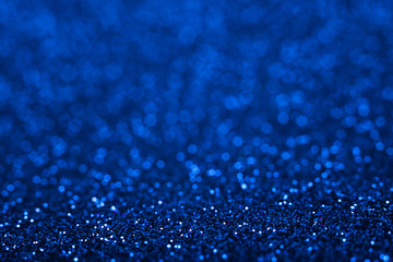 Shiny blue abstract christmas background. Blue glitter.