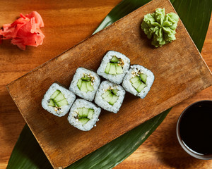 Sushi served with wasabi, ginger and soy sauce