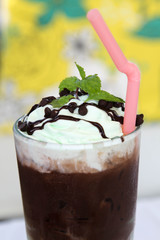 Iced chocolate drink  in transparent glass.