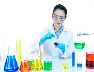 Asian female scientist working with chemical in research laboratory
