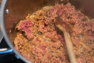 Fresh mince browning in a pot